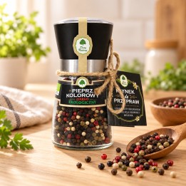 EKO Pieprz kolorowy ziarno - młynek 80g Dary Natury – opakowanie i przyprawa na drewnianym blacie