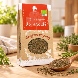 Przyprawa do kaczki EKO 40g Dary Natury – opakowanie i przyprawa na drewnianym blacie