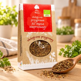 Przyprawa do mięsa wieprzowego EKO 40g Dary Natury – opakowanie i przyprawa na drewnianym blacie