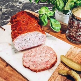 Pieczeń wieprzowa turosieńska, tradycyjnie przyprawione mięso, soczyste i aromatyczne, idealne do kanapek i dań obiadowych.